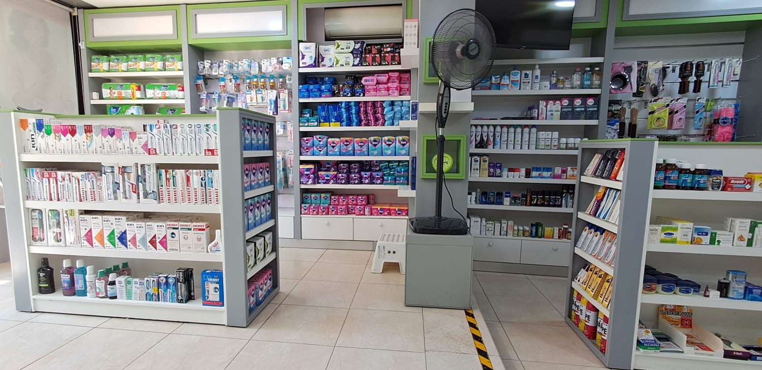 Interior aisle with personal care and health product displays