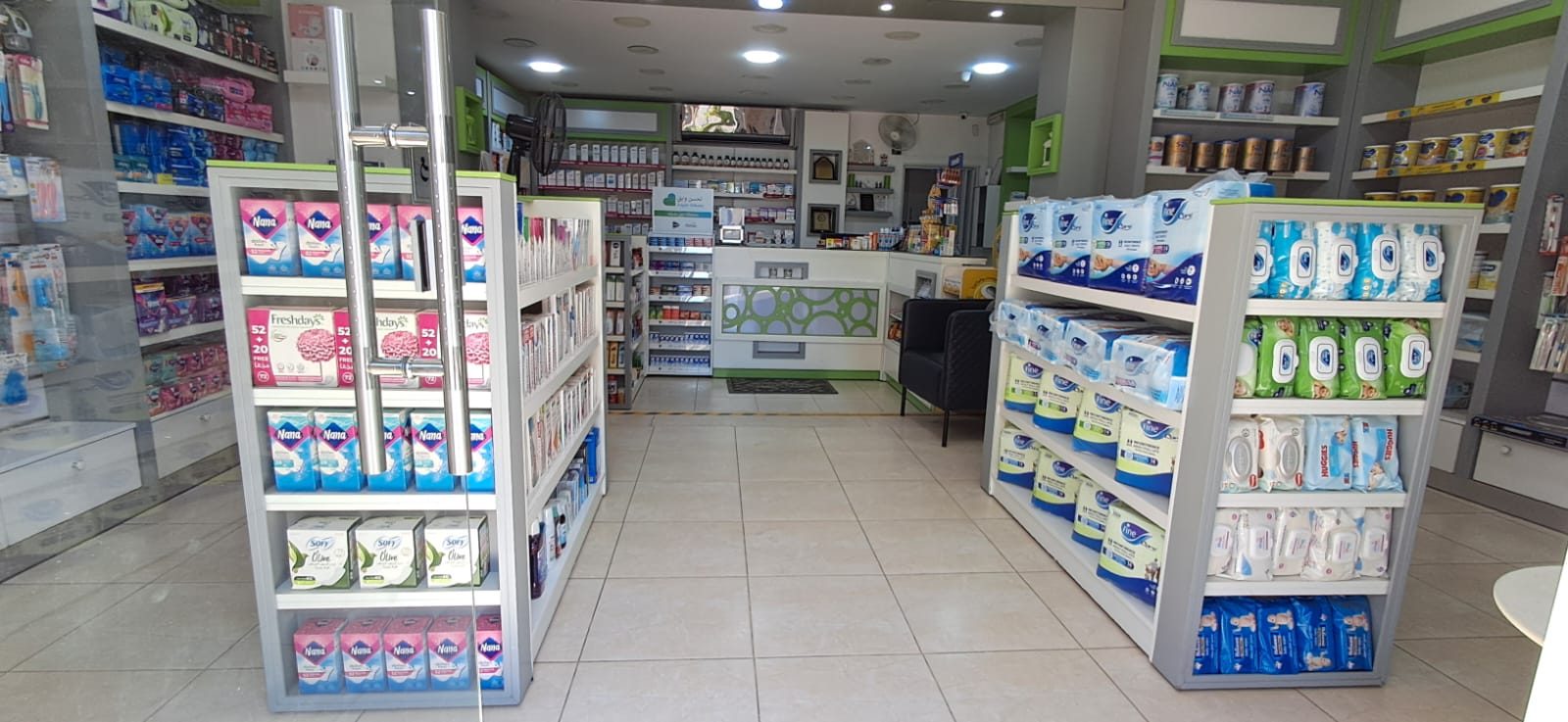 Shop floor with free-standing product stands and rear counter